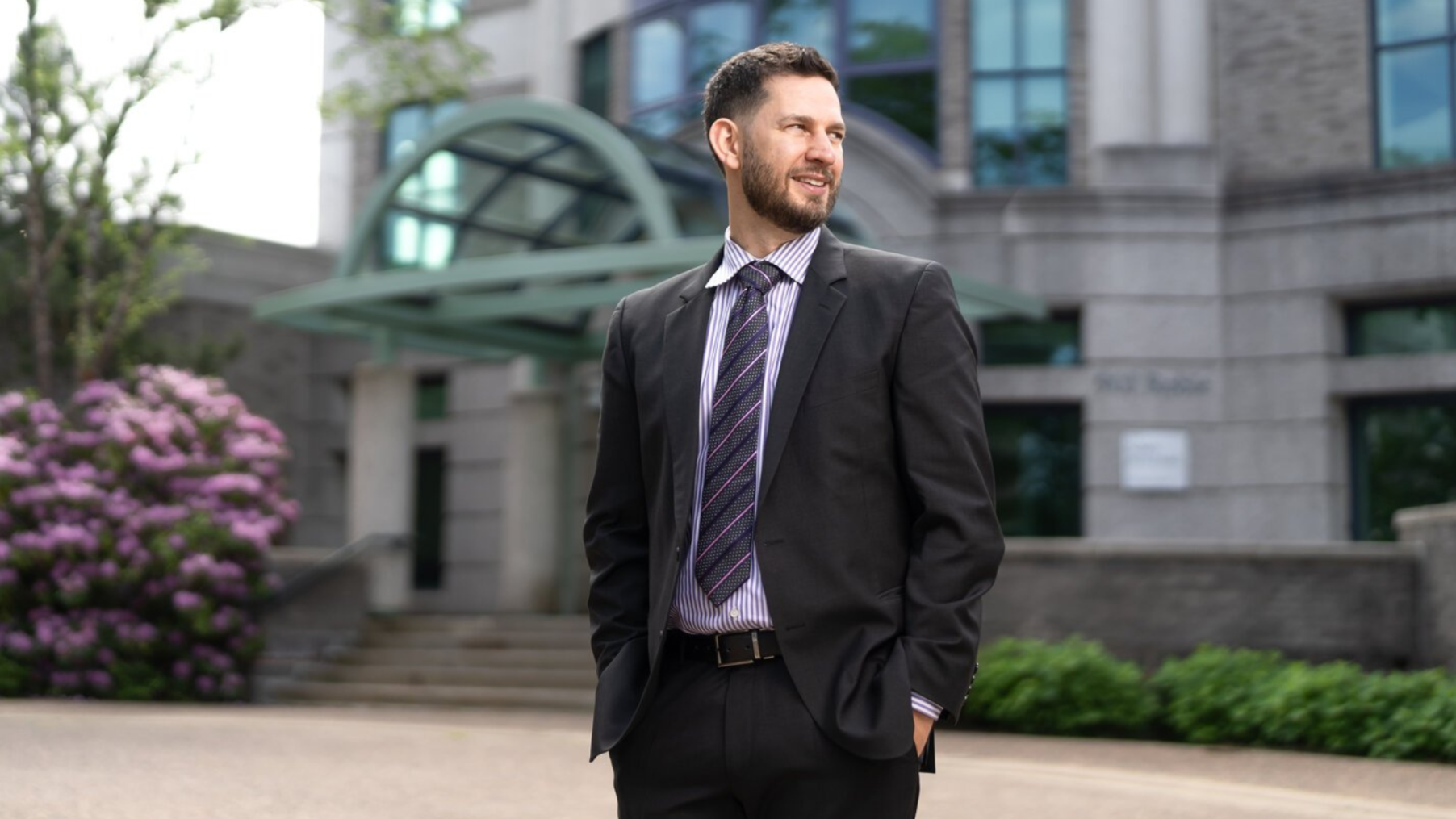 Ethan Pancer in front of Sobey building