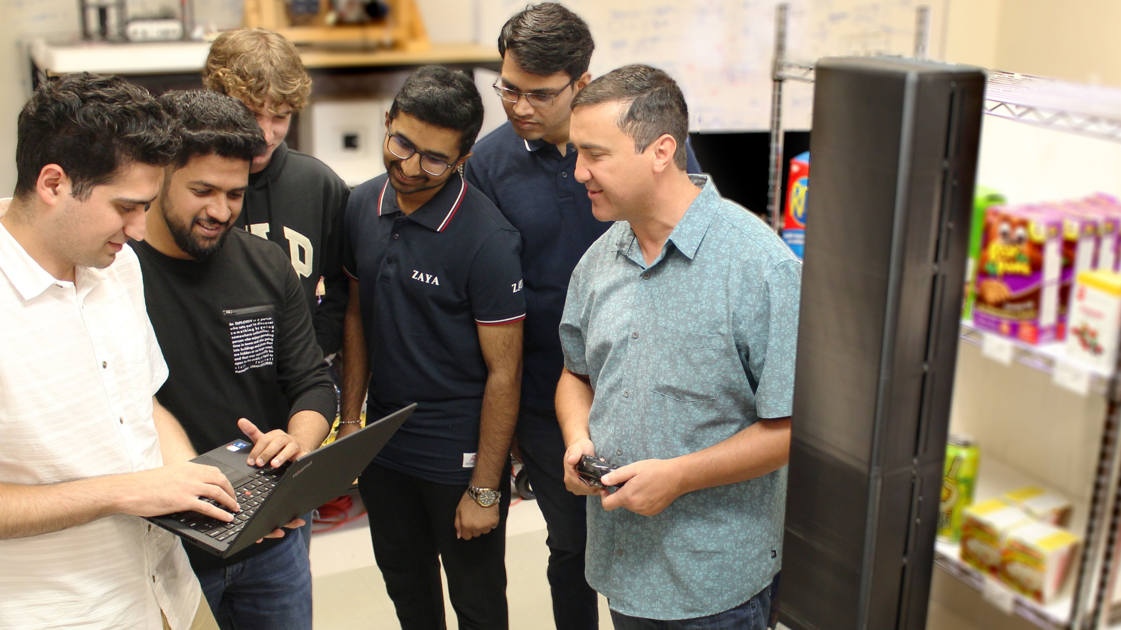 students working on robot